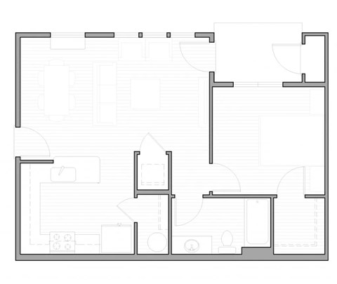 A floor plan of a house with multiple rooms and a kitchen area.